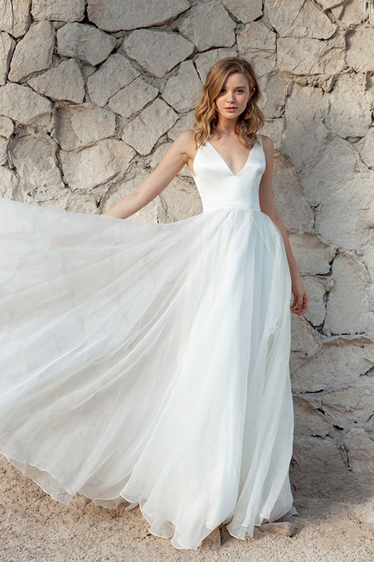 Bridal Dress Rock Wall - White Satin Bridal Boutique Ottawa - Designer & Luxury Wedding Gown - Off the rack & custom order - Bridal Seamstress